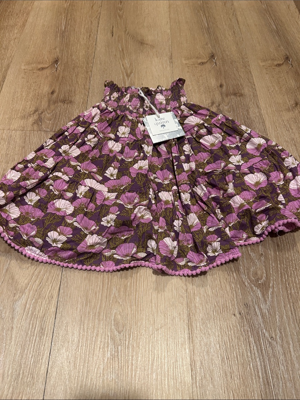 kate quinn purple and pink floral skirt with pom trim